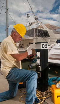 Man Working on Electrical Unit