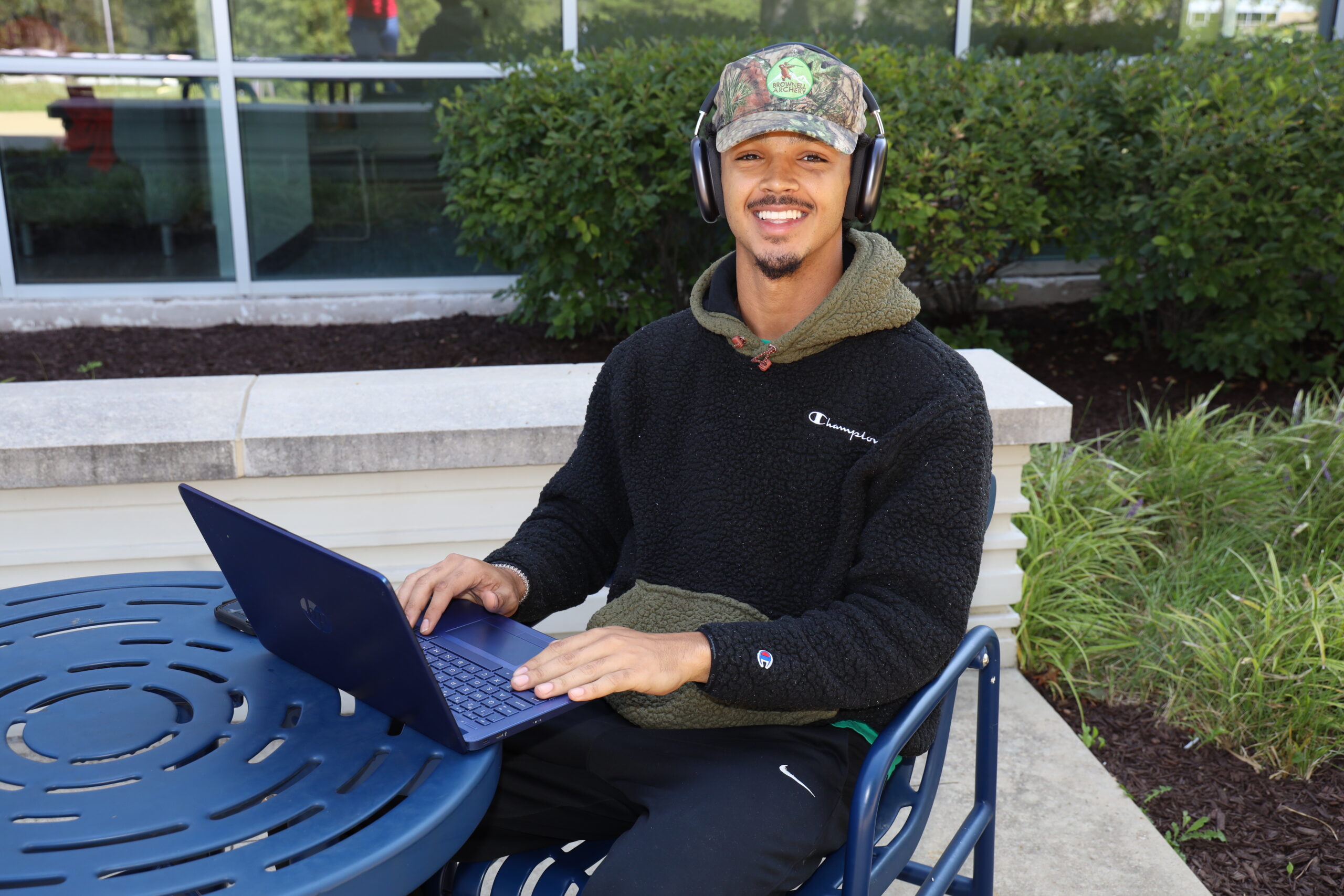 Male student outside library.