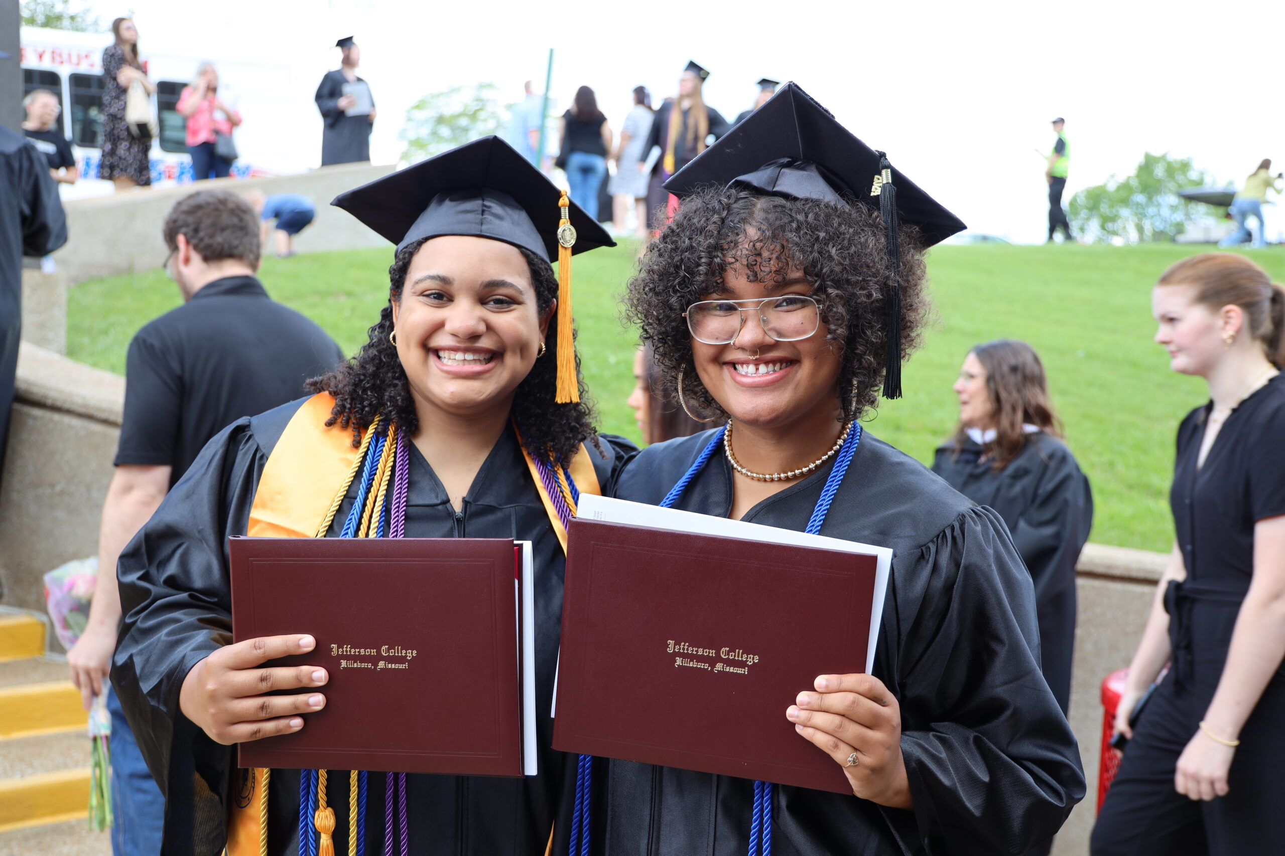 Two female students at Graduation